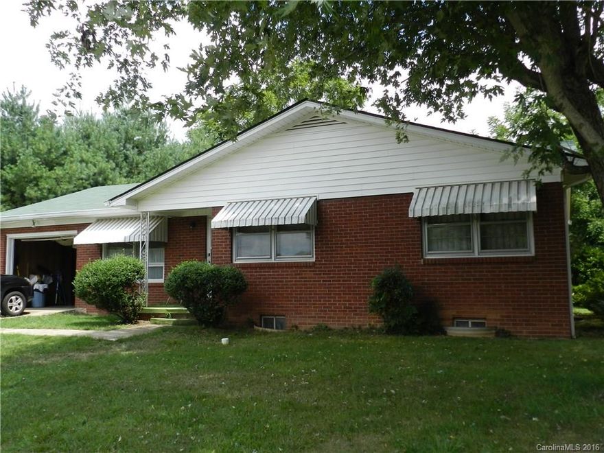 3 bedroom 2 bath house conveniently located to everything.  Quick access to I-40 east and west, Biltmore, hospital and downtown Asheville  Needs updating but has great bones.  Sold in as is condition. This home features full size basement two fireplaces one in basement with a wood stove insert a kitchen nook with large window and a kitchen hook-up in the basement.  It also has a private backyard for entertaining and family time.