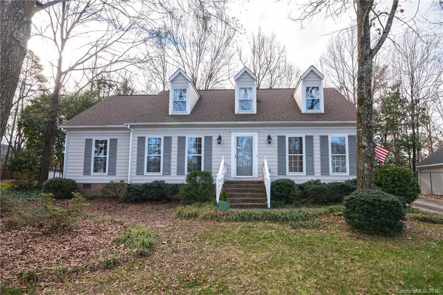 Recently renovated well-maintained 4 BR 2.5 BA Cape Cod style home tucked under a canopy of beautiful hardwoods. Private fenced rear yard and 2-car detached garage with workshop. Just minutes from the Arboretum with easy Uptown access.  The spacious great room has hardwood floors as well as a beautiful wood burning fireplace and wet bar. Well lit kitchen and breakfast. First floor Master Bedroom. Huge tiered deck perfect for entertaining with built-in seating.
