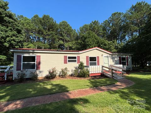 Photo of 44112 Harper Hearne Road, New London, NC 28127 (MLS # 4274304)