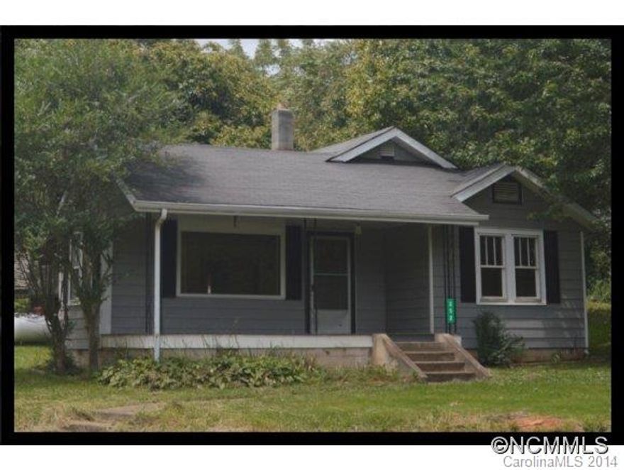 Come make this little gem on a half-acre your own.  Great home for first time buyers! Newly refinished hardwood floors. New Direct Vent Wall Furnace runs on propane and heats the whole house. Block building out back with metal roof would make a nice little workshop. Bath is between two bedrooms. (Entrance to one bedroom is through another.) 100% USDA financing available.