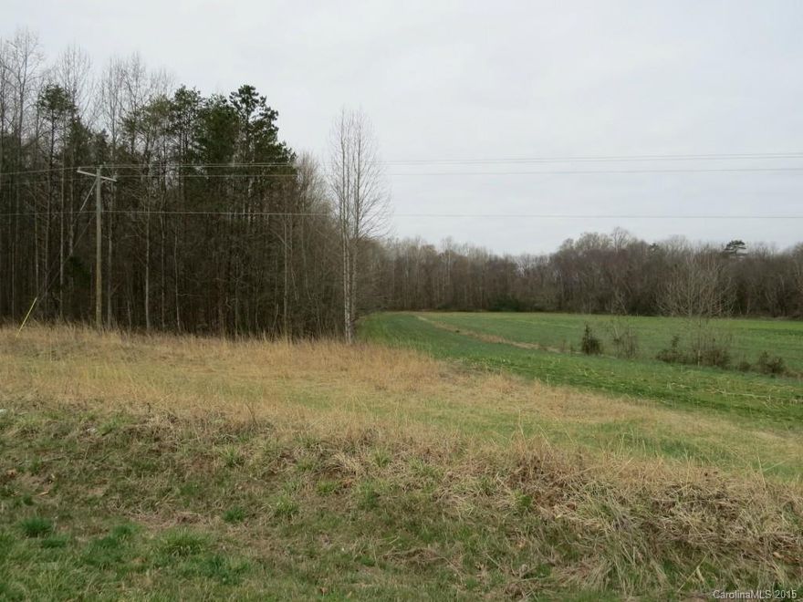 Nice rolling land in popular North Iredell area.  Convenient to I-77 and North Iredell High School.  Mostly wooded and some cleared land.  Buyer is responsible to survey and the seller will not divide. There is a portion of this property that is in a floodzone.