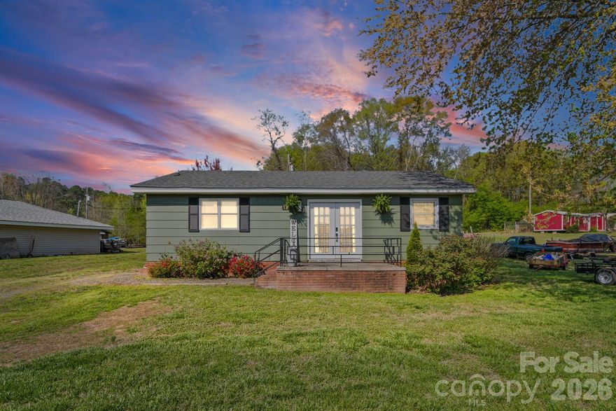 Tucked just across the water from Lake Tillery, this charming 2-bedroom, 1-bath home offers the kind of peaceful setting buyers are chasing right now. Whether you're searching for your first home, looking to downsize without sacrificing lifestyle, or ready to step into the Airbnb game, this property checks the boxes. Inside, you’ll find a cozy, functional layout designed for easy living, but the real magic happens outside. An oversized front porch invites you to slow down, sip your coffee, and take in the water views just across the way. It’s the kind of space that sells the lifestyle, not just the home. Out back, a spacious detached building with an added lean-to provides plenty of room for storage, hobbies, or future potential giving you flexibility that’s hard to find at this price point.
Simple. Strategic. Full of opportunity. And in a location that continues to grow in demand.
