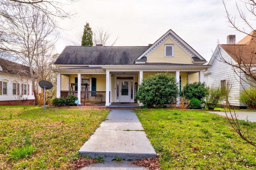 Lots of curb appeal with this 1910 beauty in Spencer!  Welcoming entrance.  This home offers 3 spacious bedrooms and 2 baths.  Large living room and kitchen/dining area.  Beautiful hardwood floors throughout most of home.  Covered front porch perfect for relaxing in the evenings.   Nice deck overlooking spacious back yard great for entertaining.  Encapsulated crawlspace.  Lots of character and ready for you to move-in.  Convenient location to I-85, restaurants, shopping, Transportation Museum and more.  Make your appointment to see today!