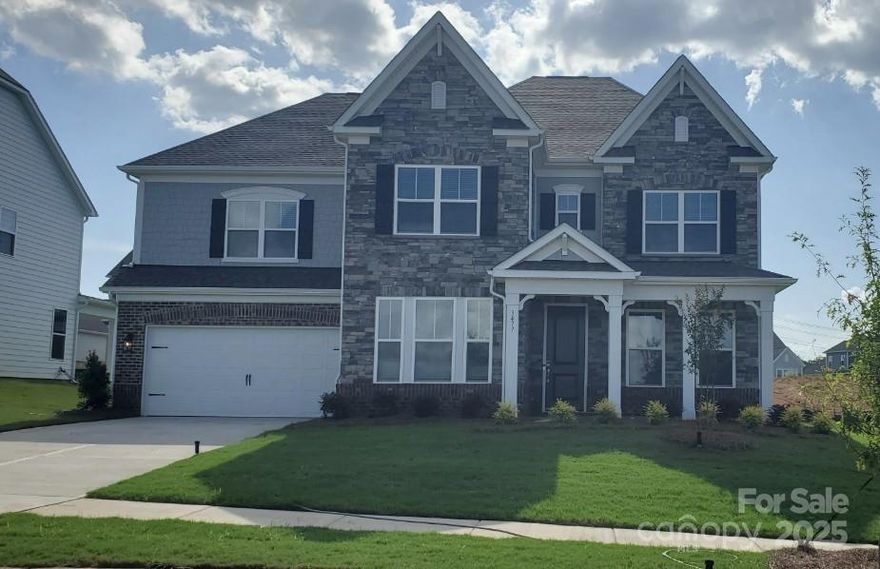 MLS#4255349 REPRESENTATIVE PHOTOS ADDED. New Construction - October Completion! Welcome to the London at 3477 Calico Branch Road in Estates at Sugar Creek. This versatile plan offers space for everyone, with standout features designed for comfort and style. The main floor includes a spacious great room with fireplace, gourmet kitchen with oversized island and wood hood over a 36" range, formal dining with butler’s pantry, walk-in pantry, study, guest suite, and screened outdoor living. Upstairs, enjoy a loft, game room, laundry, and four bedrooms—including a luxurious primary suite with two walk-in closets, soaking tub, separate vanities, and more. Nestled near I-77, I-485, and Ballantyne Bowl’s newest dining spots, this home puts you close to parks, golf, and scenic Carolina beauty. Additional Highlights Include: study, screened outdoor living, fireplace, first floor guest suite with full bath, additional bathroom upstairs. MLS#4281809