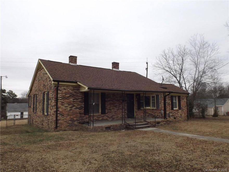 The charm of 1940-1950 architecture with some updates already done.  Fixer upper with lots of potential.  Walk to downtown Clover shops and restaurants.  Spread out in this spacious floorplan with a huge kitchen, 3 large bedrooms and 2 full baths.  Covered parking in the detached carport or use as a workshop.  A large rocking chair front porch adds to the charm.  Enjoy Clovers high performing schools which are in the top 5 school systems in the state.  A little work will pay off in big savings!