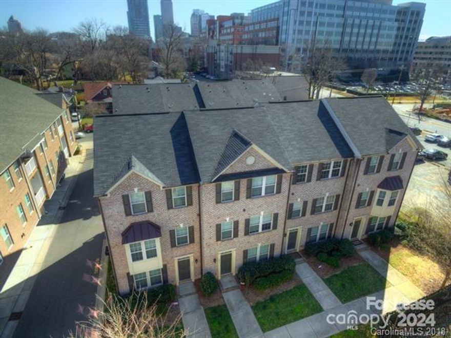 BEAUTIFUL 3 story townhome in Third Ward of Uptown. Like-new condition. 2 bedrooms / 2.5 baths. Downstairs features a living/office area with hardwood floors, half bathroom, and 1 car garage. 2nd level has an open great room, spacious kitchen, and balcony. Kitchen has granite countertops, stainless steel appliances, and pot rack. Great room has beautiful hardwood floors and pre-wired surround sound. 3rd level has master suite, 2nd bedroom, and laundry area. Master suite has 2 closets and dual headed shower. 2nd bedroom also has private bathroom. Walk to restaurants and nightlife in Uptown! Only a block from Frazier Dog Park and Irwin Greenway.