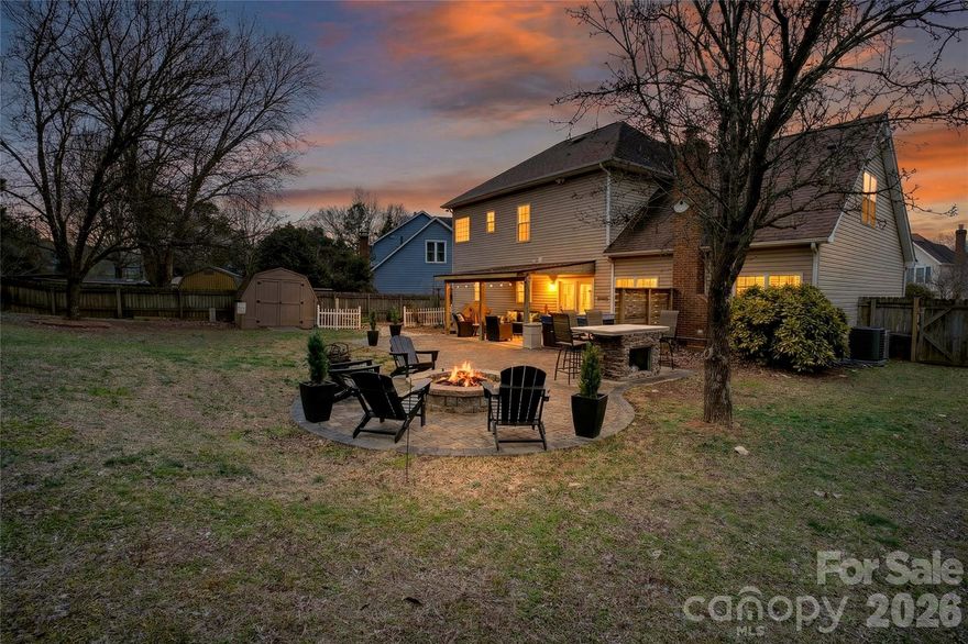 Nestled quietly between Waverly and Blakeney, this home offers convenient access to shopping, dining, and everyday amenities throughout the Ballantyne area. Located in the Polo View community, the property sits on a peaceful cul-de-sac with no HOA.

This thoughtfully maintained 4-bedroom, 2.5-bath home features a spacious, fully fenced backyard designed for outdoor enjoyment. Multiple outdoor living areas include a covered porch with a new roof, an expanded patio with a custom-built fire pit and stacked stone table for outdoor dining, a pond with waterfall feature, and additional storage. A hot tub with new cover and an outdoor TV convey, creating a relaxing backyard setting.

Inside, the home offers hardwood floors, a custom wood bar area, a gas fireplace, and two separate living areas. The kitchen has been refreshed with updated cabinetry, granite countertops, and a new gas range installed in November 2025. All three bathrooms include new fixtures, and every room features fresh paint. Plantation shutters throughout the home provide added privacy.

Conveniently located near major roadways, shopping centers, dining options, and local amenities. A well-maintained home offering a balance of privacy, comfort, and accessibility.

New carpet installed 2-6-26
New fence install taking place 2-24 through 2-26