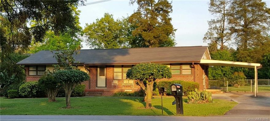 Beautiful, very well maintained, full brick construction ranch home on more than a 1/3 of an acre!  Private, beautifully landscaped fenced yard that backs to trees!  Recently remodeled kitchen, featuring ceramic tile floors, Corian countertops, self cleaning wall oven, cooktop with custom lighting and new custom kitchen cabinets. Large Laundry / Mud Room.  Hardwoods throughout, attic pulldown, security system. Gas Pack replaced in 2009.  This wonderful home is a must see that won't last long!