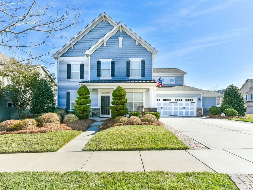 Captivating 4 BR 3 BA home w/ formal living room & dining room w/ tray ceilings.  Family room has open floor plan & stone surround fireplace.  Granite countertops w/ tile floor & backsplash in kitchen.  Guest BR/BA on main.  Spa-like master retreat w/ large bath & double closets.  2nd floor bonus room & 3rd floor media room pre-wired for projection TV.  Large landscaped yard w/ irrigation system   Two car garage w/ amble storage.  Community amenities: clubhouse, lazy river ride & fitness room.