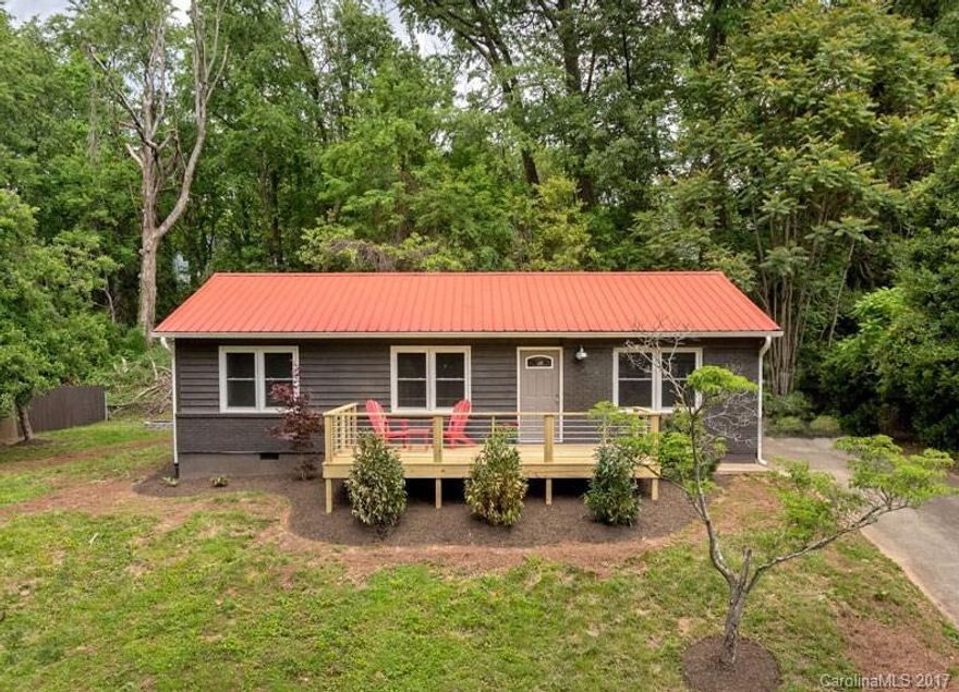 Fully updated and remodeled ranch home in the heart of West Asheville. Prime location on a quiet road near West Asheville Park, yet walkable to shopping, dining and entertainment on Haywood Rd. Many updates include new kitchen and baths, new tile and hardwood floors, modern plumbing and lighting fixtures, new heat pump and more. En suite master with custom tile work. Enjoy great outdoor living spaces including a private patio with a fire pit and huge new front deck. See brochure for details.