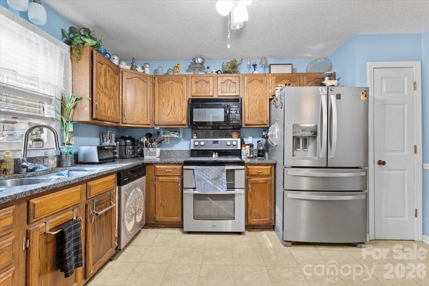 Well maintained end unit in quiet, convenient neighborhood. This is one of the few units with a full basement.  Perfect for ground level living, with primary bedroom and laundry both on the first floor. Large bedroom upstairs as well as a full bath. There's also a room with skylights on the second level that'd be perfect for a playroom or hobby room. You could also use it for storage along with the large walk-in closet up there. Back on the main level you'll find a screened in deck where you can watch the birds and deer. Not only does this unit have a full basement but you can walk out the basement door onto the patio below the screened in deck. New roof coming soon. This community is just a short drive to Brevard, Hendersonville, the Asheville airport, and golf. Don't forget the community pool!