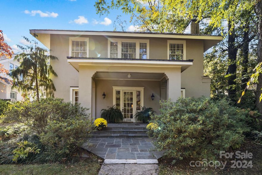 Own a signature Myers Park home on the quiet, quaint, enchanting street named Dartmouth Place. This 1927 classic Colonial Revival home features historic details thoughtfully preserved & renovations w a nod to true craftsmanship. Step inside this lovely home that has 10' 6" ceilings on the main (9' upstairs), intricate detailing on the crown moulding, a sun-filled home office w custom & original built-ins, & a large living room w a marbled surround gas fireplace. Original heart pine & quartersawn oak floors command your attention & radiate a warm glow throughout this beautiful home. The formal dining room has a seamless flow into the generously sized, year round, outdoor space that is designed for relaxation, dining & gatherings. The kitchen is lovely w integrated appliances, honed marble countertops, Viking range, an eat-in counter & butler's pantry. If you love "old houses" this is a move-in ready charmer waiting for you! DETACHED GARAGE with finished flex & unfinished living space!