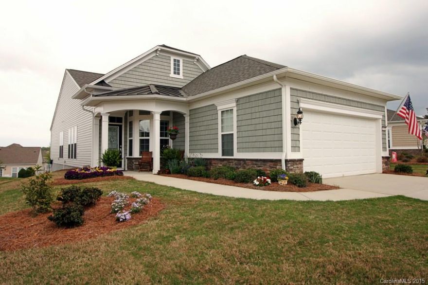 Beautifully finished, highly-desired Pine Spring floor plan! New plantation shutters throughout entire home (exc sunroom). Upgrades include added windows, brand new upgraded carpet (2014), granite, raised bartop, hardwoods, ceramic tile, stainless appliances, and a bright sunroom leading to new expanded deck (2014). Open and inviting with front office/flex room with french doors (or 3rd bd), finished garage has workshop area and industrial finished floor. Irrigation system and landscaping added.