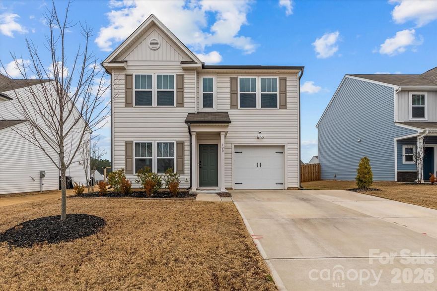 Well-maintained 3-bedroom, 2.5-bath home located in the desirable Hidden Lakes community. Conveniently situated near downtown Statesville, Troutman, and Lake Norman, with easy access to I-77 and I-40. The open main-level floor plan features a spacious kitchen with upgraded cabinetry, quartz countertops, tile backsplash, and stainless-steel appliances. The second-floor primary suite offers a large walk-in closet and a bright, inviting bathroom with easy access shower. A second-floor laundry room adds everyday convenience. Spacious backyard with concrete patio allows for easy entertaining. This move-in-ready home is waiting to welcome its new owner. 100% financing with no downpayment is possible on this property.