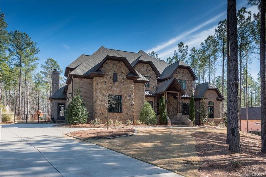 Breathtaking custom-built home in Fort Mill’s desirable Trinity Ridge. Beautiful hardwood floors. Gourmet kitchen. Owner’s suite on main. Gorgeous sunroom. Media room with wet bar. Great room opens to covered patio. Great home for family and entertaining! In Exceptional Fort Mill School District.