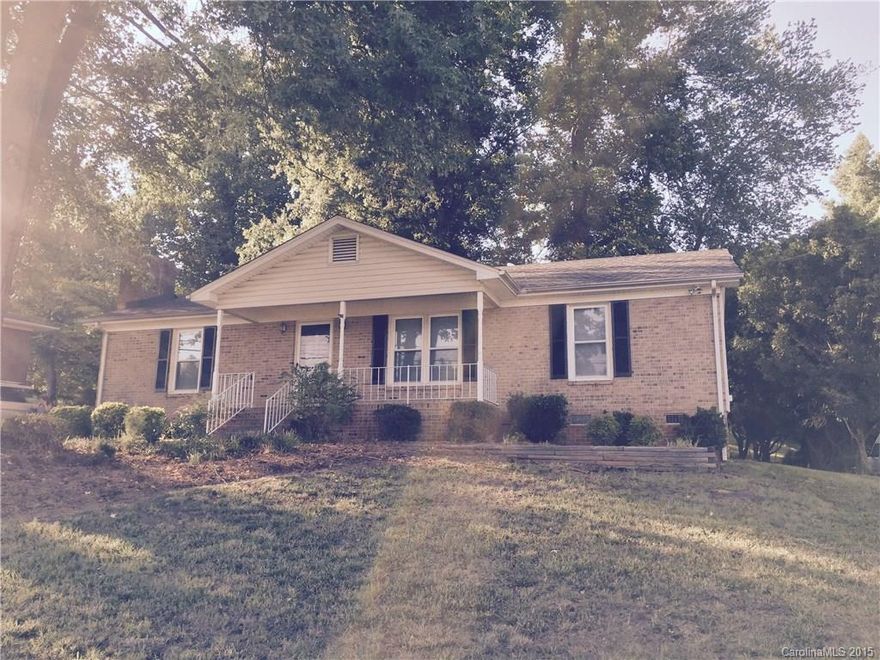 Cute brick and vinyl ranch! Entire house freshly painted new kitchen appliances, bathrooms, carpet and hot water heater. Large eat-in kitchen w/pantry. Outdoor storage building with garage door. Must see! Qualifies for USDA financing! 12 month Home Warranty provided by seller!!