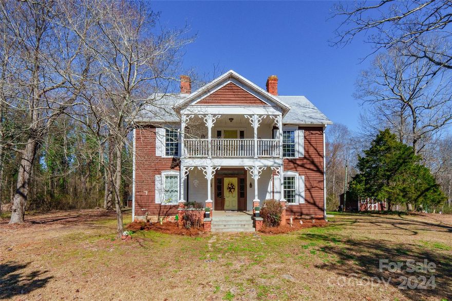 Discover the epitome of charm and spaciousness in this captivating home nestled on just under 5 acres of picturesque land. Step through the covered front entrance into a world of warmth and comfort, where hardwood floors grace the majority of this 5 bedroom, 2 bath home. The kitchen boasts stainless steel appliances, adding a touch of modern elegance to the home. Conveniently, one bedroom is situated on the main floor, while the remaining four bedrooms are located on the upper floor, where a walkout balcony provides a breathtaking view of the expansive grounds. Outside, two sheds on the property convey, offering ample storage space. With its rich history of serving as a wedding venue, this home exudes a timeless allure and offers endless possibilities for creating cherished memories. Don't miss the opportunity to make this enchanting property your own!