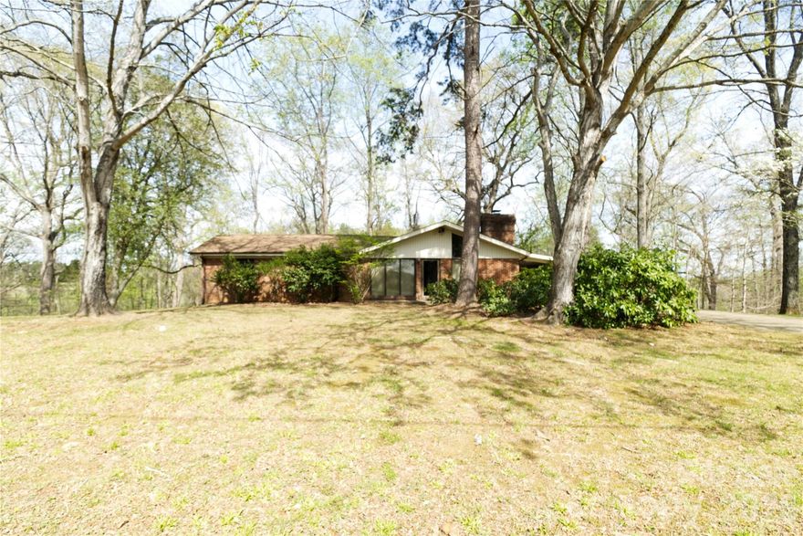 Hidden opportunity in a great location. Full basement with rough plumbing for a kitchen and bath, bring your imagination and add finished footage. Great lot with lots of privacy.