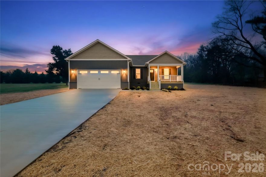 NEW construction 3 BD / 2 BA house designed for comfortable single-level living with an open and functional layout. The main living area connects seamlessly with the kitchen and dining space, creating an efficient flow for daily living and gatherings. The kitchen features a large island with seating, granite countertops, modern cabinetry, stainless steel appliances, and stylish pendant lighting. The primary bedroom offers a walk-in closet and a private bath with dual granite vanity, matte black fixtures, and a walk-in shower. Two additional bedrooms provide flexible space and have a full bathroom located in between with granite vanity and updated finishes. Other features include luxury vinyl plank flooring throughout, recessed lighting, ceiling fans, neutral warm color palette, and a separate laundry room. An attached two-car garage adds convenience and storage.The craftsmanship and modern finishes make this newly built home move-in ready.