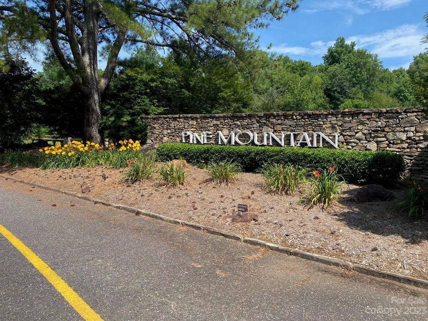 Pine Mountain is a quite and wildlife friendly community in very close proximity to South Mountain State Park. The State Park has miles of hiking trails, waterfalls, pavilions and campsites. This is a great opportunity to build your next mountain getaway home with the privacy of your own 13.4 acres. No minimum square footage to build. A new home must be constructed on a foundation. All new construction must be approved through the Environmental Control Committee application process. Set-backs are 35ft in the Front, 25ft in the Rear and Sides are 15ft. Water tap-in fee is $1100. Road Impact fee for new home construction is $1000. POA assessments are $78.24 per lot per month. A single residence home with water and trash service is $143.06 per month. No hunting within community. Pine Mountain POA office is open for phone calls Tuesdays and Thursdays from 8am-12pm for additional information regarding subdivision. You can reach them at 828-437-4894. Subdivision website: PineMountainNews.com