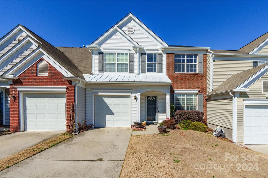 Welcome to this stunning 3 bedroom, 2.5 bath townhome! As you step inside, you're greeted by the timeless elegance of hardwood floors that flow seamlessly throughout the main living areas. The open floor layout invites you to entertain with ease. The kitchen has been thoughtfully redesigned with new granite countertops and cabinets. As the evening sets in, cozy up by the inviting gas log fireplace in the great room, creating the perfect ambiance for relaxation and warmth. Retreat to the primary bedroom, your private sanctuary, where tranquility awaits in the ensuite bathroom complete with a garden tub and separate shower. Step outside to discover the beauty of a new roof installed in 2019 and a sprawling deck, ideal for hosting outdoor gatherings. Nestled in a prime location in Charlotte, this townhome offers easy access to shopping, dining, and entertainment, ensuring you're never far from the action. Don't let this opportunity pass you by!