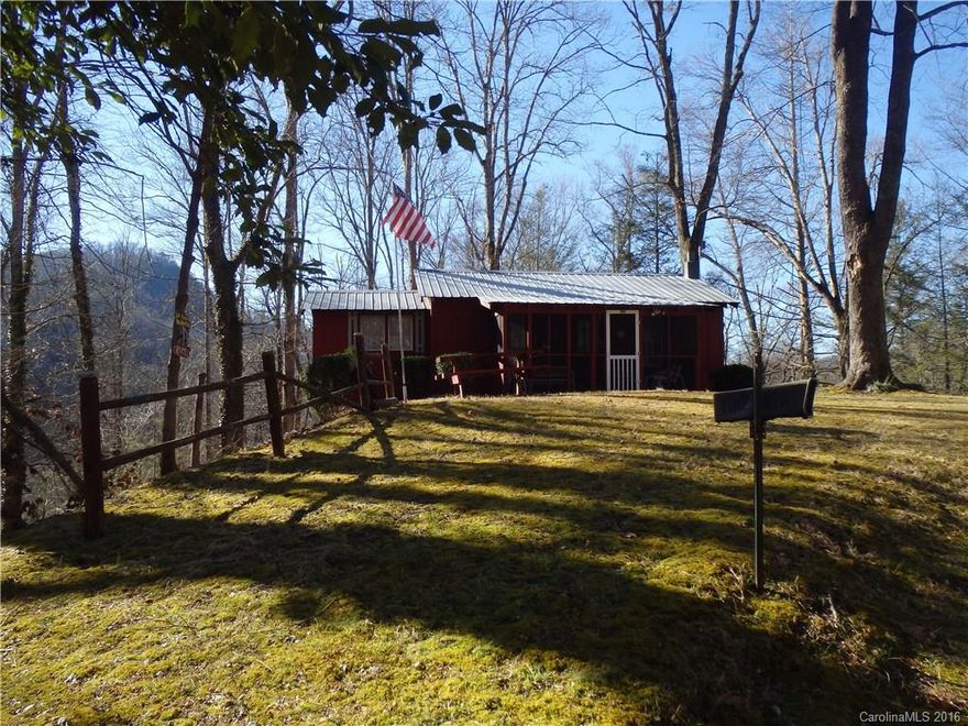 Perfect summertime getaway in Bat Cave, NC. Two bedrooms, one bath, screened porch, fully furnished. 1-1/2 miles from beautiful downtown Bat Cave. Great shape, come take a look. This one won't last long! Turn onto Hwy 9N in Bat Cave and go 1.5 miles to Old Fort Loop road on left. Turn here and it is the first house on right. See real estate sign in yard.