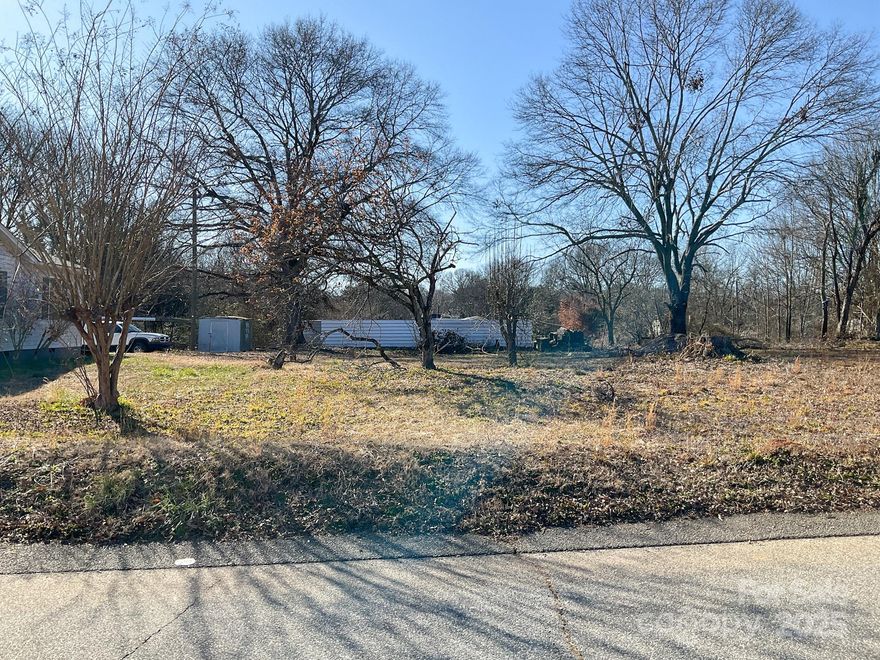 Buildable lot on Greer City Street. No HOA!
Adjacent house is listed by same owners. Looking to sell as a package for $240,000 total. (TMS# 9-03-14-266.00)