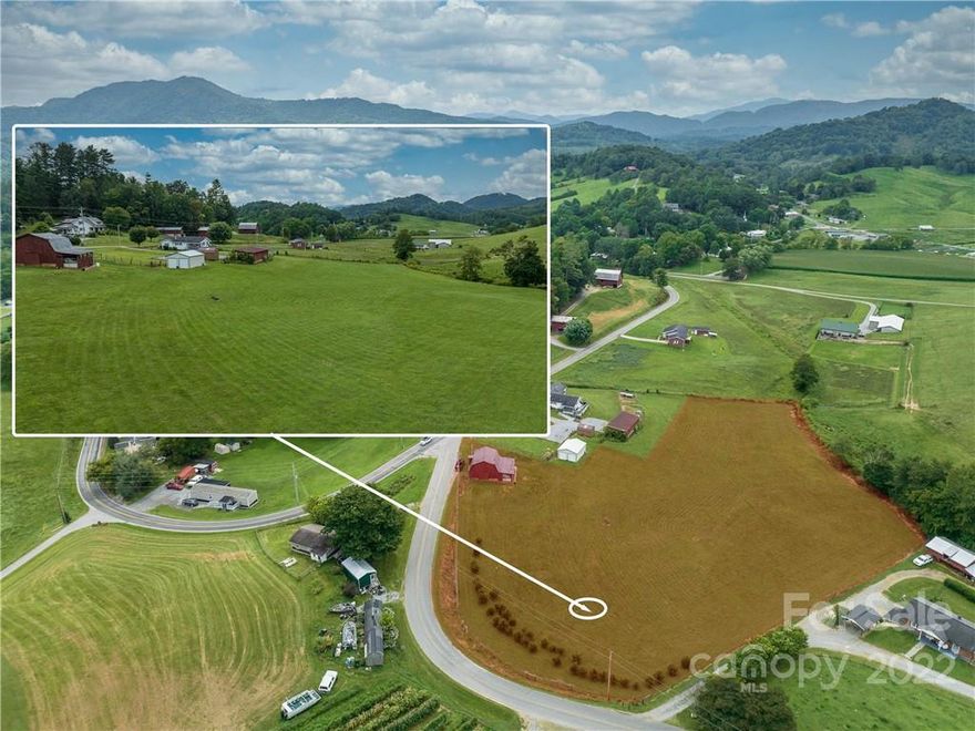 Rare opportunity in the Iron Duff Community. This property is ready for your dream home and has year round beautiful mountain views. Easy access from paved state maintained road. The well, 3-bedroom septic is already installed, large red barn, and detached 2-car garage already on property.  Located approximately 30 minutes to Asheville.