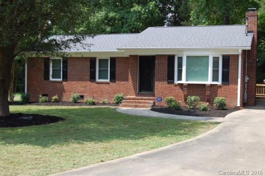 This adorable Completely Updated 3 bdrm/ 2bath Brick Ranch is almost NEW !!! Looks like a home on HGTV !!! There is a brand new roof, all new windows, new water heater, new flooring, cabinets, granite, faucets, hardware, interior doors, paint, 2" faux blinds, pretty much everything !!! All this sits on a cul de sac lot that backs up to trees with a beautiful deck to relax on.  Nothing to do but move in !!! Home is located with easy access to I77, shopping and dining.  Won't last long !!  No HOA