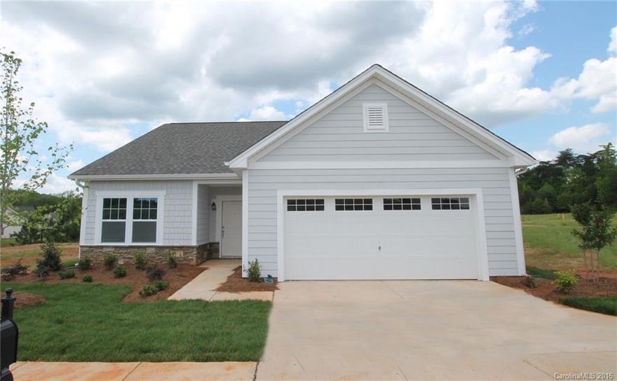 Start your summer off in the amenity & activity filled community of Edgewater.  Edgewater boasts a competitive golf course, a peaceful lake, community pool & tennis courts.  This home is competitively priced and offers a 3bd/2bth ranch plan appointed with upgrades expected in a NEW home.  Highlights include Hardwood & Ceramic Tile Flooring, Granite Countertops, Stainless Steel Appliances, Two Tone Paint & more.  Seller contributes closing costs with use of preferred lender.