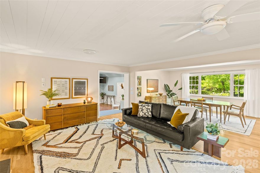 Solid Mid-Century Character with Unmatched Privacy in Grove Park!
If you appreciate the "built-to-last" era of 1959, this unique, custom-built brick ranch is a Must-
See! Tastefully remodeled, this home offers the perfect blend of original Mid-Century charm
and modern functionality. The sprawling, open living area is filled with natural light and is
anchored by a statement wood-burning brick fireplace.  Stunning original white oak flooring,
combined with a crisp color palette, sets the modern ambience. A wide hallway leads to three
bedrooms and two full baths; one recently renovated with a walk-in shower, while the other
one retains its original, classic charm. The oversized eat-in kitchen with a center island and
vaulted ceilings is an entertainer’s dream.  Just off the kitchen is a separate laundry and storage
room. The detached garage includes 240V/50-amp connectivity for a shop or EV charging and
has been pre-approved by the city for conversion to an Accessory Dwelling Unit. Grove Park is
one of Charlotte’s best-kept secret neighborhoods with Mid-Century era homes on large lots
and mature tree canopies, surrounding a series of pocket lakes--a rarity within the Charlotte
city limits! The home is tucked away on a quiet cul-de-sac, steps from Williams Lake. The
thoughtfully landscaped oversized lot offers the perfect blend of privacy and convenience,
making the home feel like a retreat of its own. Easy commute to Uptown Charlotte, the NoDa
Arts District, Plaza Midwood, and the University City area. This is a rare opportunity to secure a
high-utility property with a Mid-Century soul in a prime location. You're going to love it here!