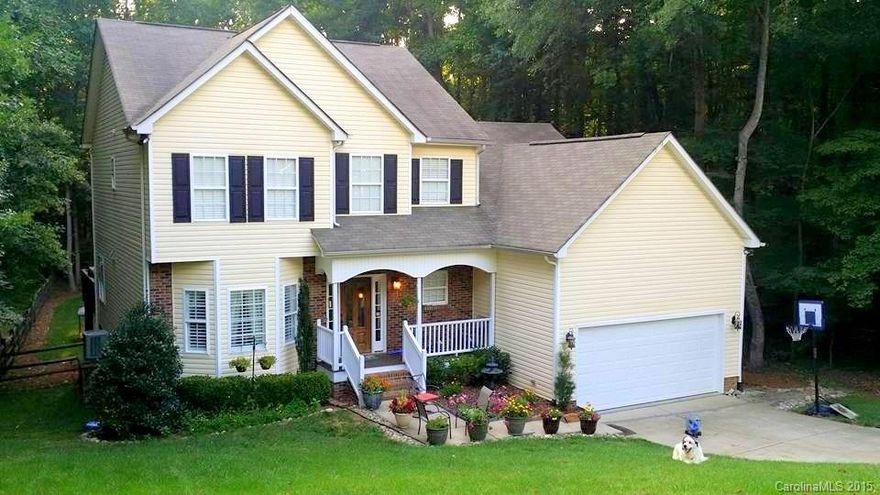 Custom home minutes from SouthPark, shopping, dining & I485.Attention to detail w/beautiful hardwoods on the main level,heavy moldings,custom shutters & blinds,stunning 2story great room & designer kitchen.Main level owners retreat boasts a luxury bath w/jetted tub & custom tiled shower.Relax outdoors on the spacious deck & take in the peaceful parklike setting overlooking the McMullen Greenway! The home is in 100 yr. floodplain & requires flood insurance but the structure IS NOT in floodplain.