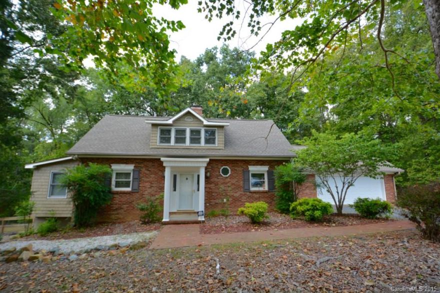 One of a Kind home with total Privacy and only 3 minutes to Concord.   Originally designed and owned by an Architect, you see many unique features and details throughout the home.  Roof replaced in 2012 as well as the rear deck expanded to included a therapeutic hot tub.   The full basement with a wood burning fireplace and full bath works equally well as an additional bedroom, office,  or family room.   Detached Garage and separate drive way is perfect addition for Boat,  RV, or Equipment.