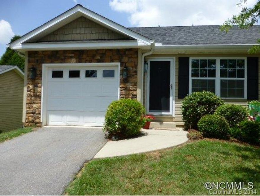 Nice starter duplex or for buyers downsizing, many updates. Open floor plan, cozy living area with propane firepl. Lrg kitchen with loads of cabinets and counter space is a "cooks dream".  Corian counter tops with extended peninsula for extra seating. 2 nice bedrooms, walk in closets, master has french doors which open to a deck area with views of perennial garden and mountain. One car garage, attic stairs for storage access. 10 min to downtown.