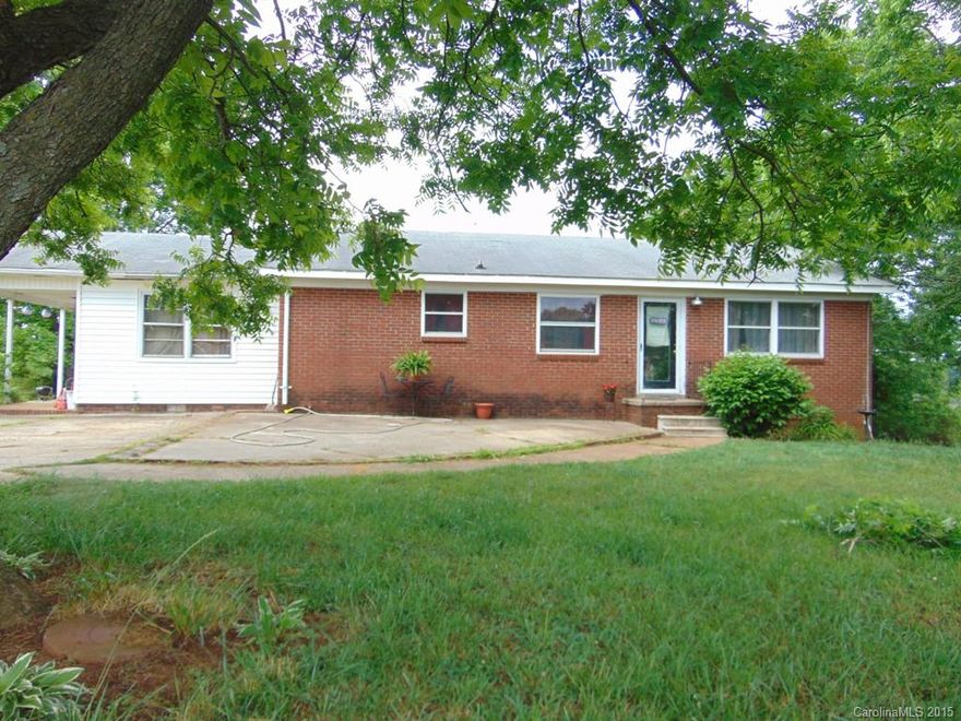 3 Bedroom 1 Bath Brick Ranch with basement and bonus/Den room, home needs a few updates.  Has a patio in the front and a side porch.  Large, mature pecan trees on the property and a view that feels as if the sky is kissing the land....Stars galore of the night....This is your home if you don't mind fixing up and putting your touches on an adorable home to make it yours!  Home does need roof repair.