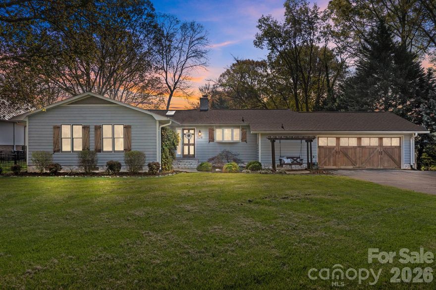 Rare opportunity to own a truly special Lake Norman waterfront retreat where lake living meets peaceful charm of the country. Nestled in a quiet cove, this one-level home offers the ideal blend of privacy, comfort, and connection to nature. A two-tier dock accommodates a boat or jet skis, while the dock house provides convenient storage for fishing gear and lake toys. Designed for exceptional indoor-outdoor living, the home features a spacious sunroom, screened porch, and multiple open-air decks that invite you to relax, entertain, or just take in the tranquil surroundings. A separate lakeside studio adds even more flexibility, perfect for a creative space, guest overflow, or a private hangout. Inside, the home is warm and inviting with a focus on comfort and style. The living room is anchored by a beautiful stone fireplace. The kitchen features quartz countertops, a breakfast bar, gas cooktop and a lovely copper sink, blending functionality with elevated design.  The layout offers 3 bedrooms, 2 full bathrooms, plus an office/bonus room with a half-bath.  Modern smart-home conveniences enhance both security and ease of living, including Ring cameras at the front door and dock, lockable gated lake access, and Wi-Fi-enabled door locks, garage door, and irrigation system.  The flat, fenced backyard offers a fire pit and plenty of space to play or unwind. Loads of storage with a garage and a workshop and space underneath the back deck.  Located in a peaceful, low-traffic community, perfect for walking, biking, or golf cart rides while still being conveniently close to grocery stores, restaurants, and shopping. Nearby Little Mountain Park offers additional outdoor recreation, and Charlotte Douglas International Airport is less than an hour away.  With no HOA and potential for turn-key short-term rental use, this property offers flexibility whether you're seeking a full-time residence, weekend escape, or investment opportunity. A rare chance to experience effortless Lake Norman living at its finest.