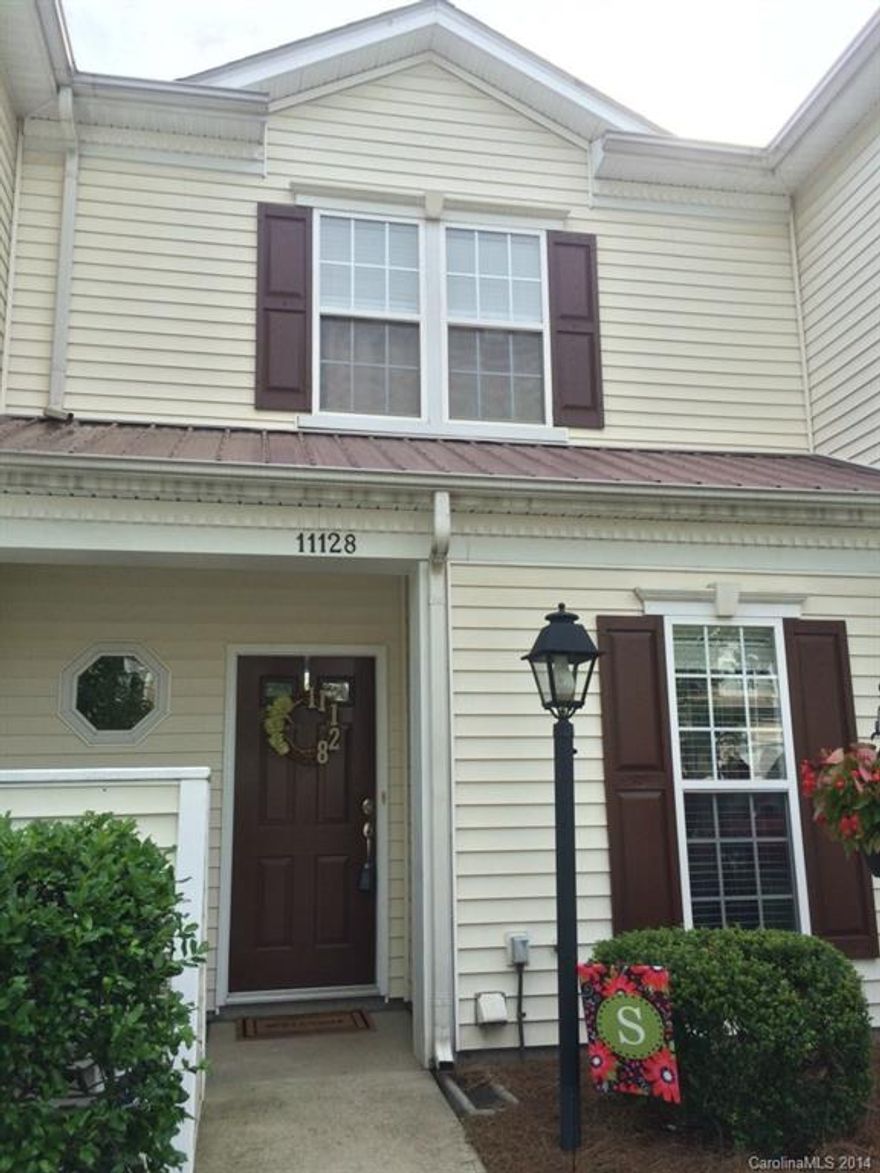 Designer townhouse complete with updates including NEW hardwood floors, carpet, paint, fixtures and hardware.  Open, bright kitchen with pantry, dining area and oversize family room.  Powder Room on main level.  Vaulted ceilings, walk-in closets, & ceiling fans in both bedrooms.  This home is move in ready!!!