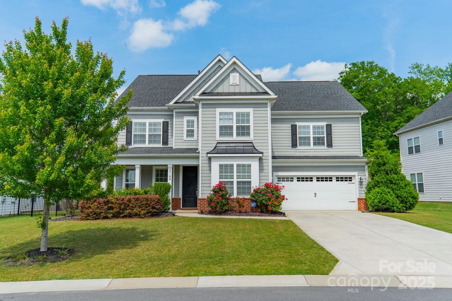 Popular London plan by Taylor Morrison in Waterside at the Catawba! This beautiful 5-bedroom, 4.5-bathroom home is the one you've been waiting for. Featuring both a formal dining room and an office, a large family room with a gas fireplace, a chef's kitchen with too many upgrades to list, a breakfast nook/built-in bar (with wine fridge) sitting area, and a guest suite with full bath downstairs - you'll be impressed as soon as you walk in the door! Upstairs is the primary suite, 3 additional bedrooms, plus a loft and a bonus room! An updated sunroom overlooks the outdoors, which features a beautiful custom paver patio with a built-in gas grill, fire pit, seating area, and an oversized yard ready for a pool! Zoned for the award-winning Fort Mill school district, community amenities include a pool, club house with gym, tennis courts, parks, and playgrounds - this home is everything you could want and more!