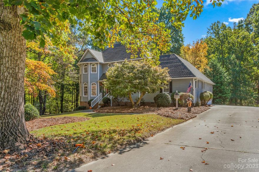 Explore this recently updated roomy residence that features a primary suite, a welcoming living area, that flows into a tastefully updated kitchen and dining room. The convenient laundry space on the main floor just adds to the rest of the home. Upstairs, you'll find three bedrooms and an office. The basement boasts brand-new flooring, cozy fireplace and a bar area. Discover numerous versatile rooms that you can customize to meet your specific needs. Don't miss out call me today for your private tour!