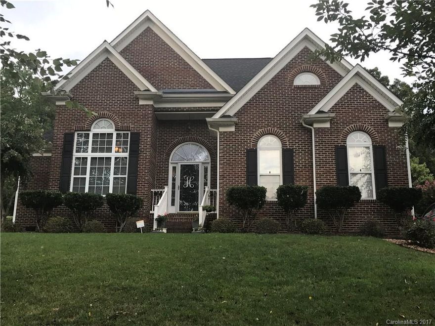 Absolutely beautiful light filled home w/stunning backyard oasis.Large rooms w/incredible molding, chefs kitchen with stainless appliances,wonderful great room with fireplace and gas logs.Enjoy entertaining in the private backyard oasis w/deck and patio & lots of room to enjoy the outdoors.Master on main with tray ceilings, 2 bedrooms upstairs w/fabulous bonus room that could be 4th bedroom.Owner waiting on new granite kitchen counter tops to be installed.  Hurry to see-this home won't last long