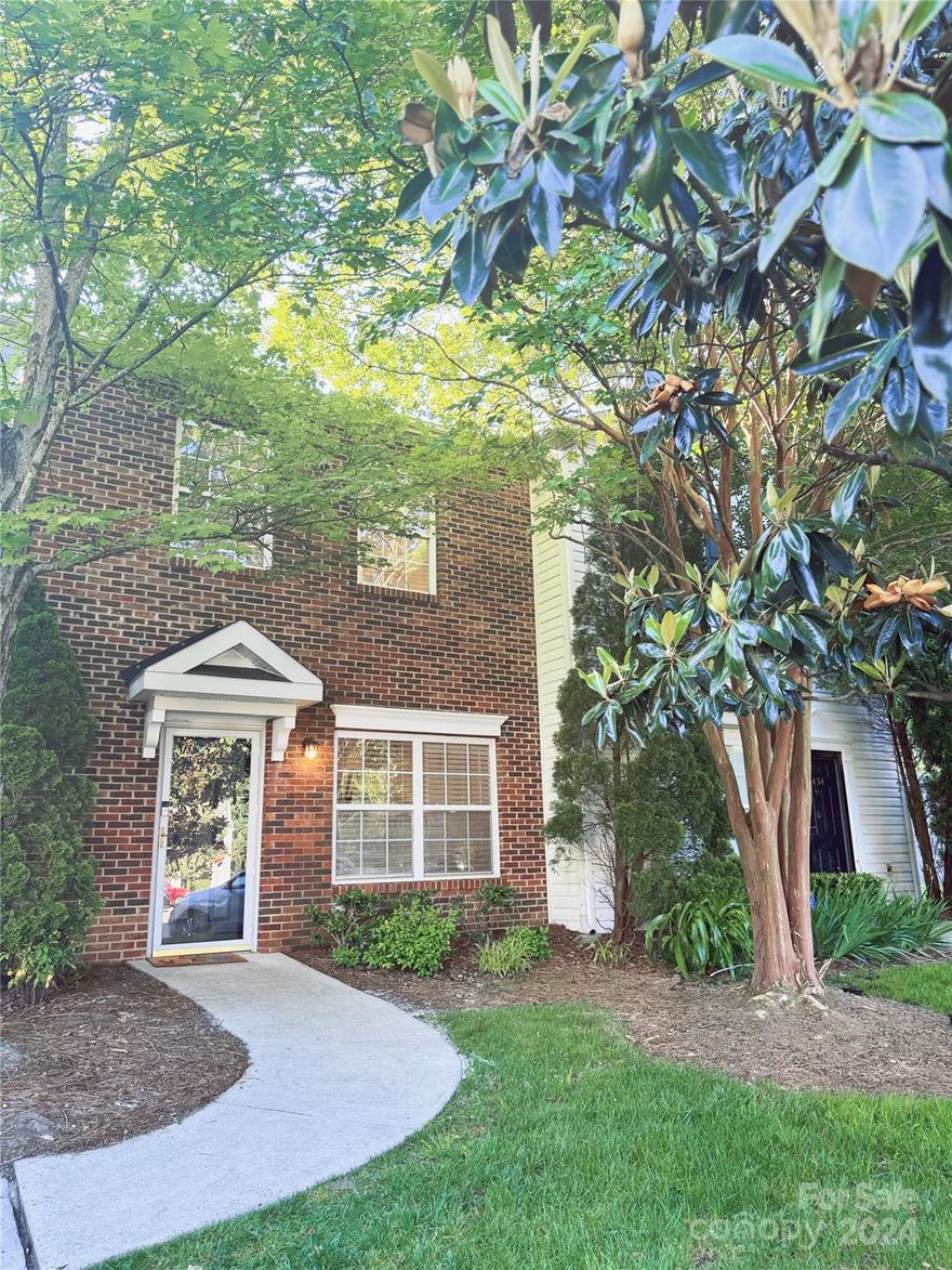 Wonderful opportunity for this charming brick townhome in a gated community. This beautiful townhouse has been well maintained with a lot of recent updates and move in ready. Two bedrooms upstairs with en suite bathrooms for privacy. Bright kitchen with stainless steel appliances and touchless sink faucet. The family room has a cozy fireplace and built-in bookshelves. New LVP floor throughout. Washer and dryer remain. 7 minutes to UNCC, 20 minutes to Uptown, easy access to freeways, close to every wonderful things the University area has to offer.