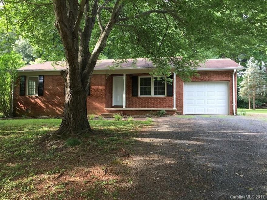 Brick ranch with new tile and laminate floors.  New kitchen cabinets, new bathrooms, new windows.  Sold "As Is"