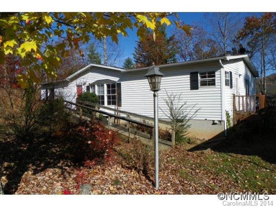 Sold As-is this property has loads of potential in a nice quiet neighborhood that holds it's value well.  Close to the interstate for convenience to Asheville and Weaverville.  Home needs TLC  but has a solid rental history at 850 per month.  Nice carport with attached storage area on a nice lot with mountain views.  Price to move quickly.....take a look today!-