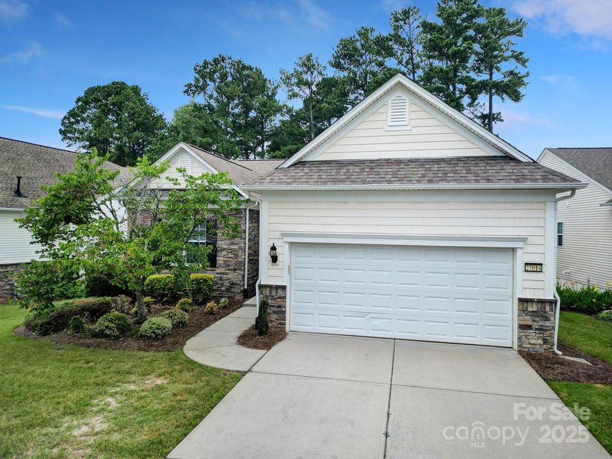 Beautiful home w/finished bsmt on a private, wooded lot in 55+ Sun City Carolina Lakes. This home features wood flooring throughout main living areas. The open kitchen has granite counters, gas SS appliances, pantry, backsplash w/accent tiles, & a breakfast bar. The spacious great room flows from the foyer & has a gas-log fireplace w/ a mantle. A light-filled sunroom extends off of the dining area, & leads out onto the covered deck, a perfect place to enjoy the views & your favorite beverage. Primary suite has a tray ceiling, ensuite bath with dual sink vanity, soaking tub, glass enclosed shower, & a walk-in closet. The den/flex space is great for a home office or hobby room! Downstairs offers a finished bsmt w/living room & game/flex area separated. Plus, an additional bed/bath & unfinished storage room, ideal for woodshop! Glass door leads out onto the spacious covered patio for add'l outside enjoyment. Don't forget to check out the resort style amenities, golf & local shopping.