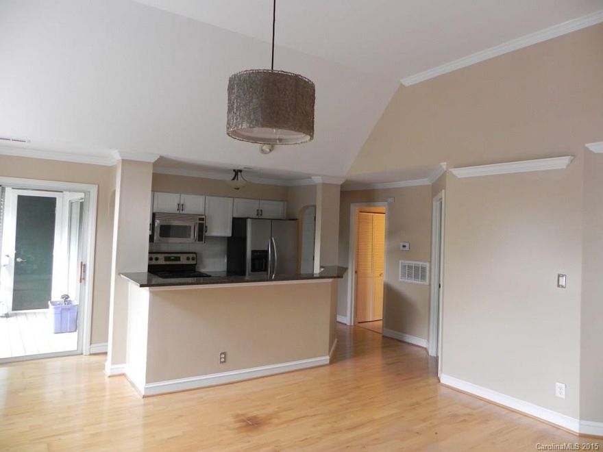 Nicely updated top floor condo at beautiful Village of Eastover Glen.  Granite counters, hardwood & ceramic tile floors, SST Appliances, nicely painted with very large closets.  Both bathrooms have been updated with ceramic tile and granite counters.  New HVAC system in 2014.  Very private 3rd floor large deck.  Community has awesome community pool.