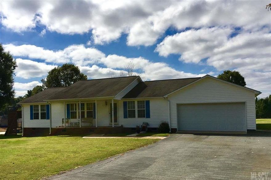 Ranch style modular home w/2 bedrooms + Office & 2 full baths. The office backs up to the garage & garage has plenty of room to add a closet to office to create a true 3rd bedroom. Open concept living spaces. Large master bedroom w/walk in closet & master bath w/double sinks, separate vanity & soaking tub. The oversized 2 car garage has a work bench, divided storage area & two walk outs, one on side & one to the back yard. Back deck overlooking flat backyard. Storage building w/lean to.