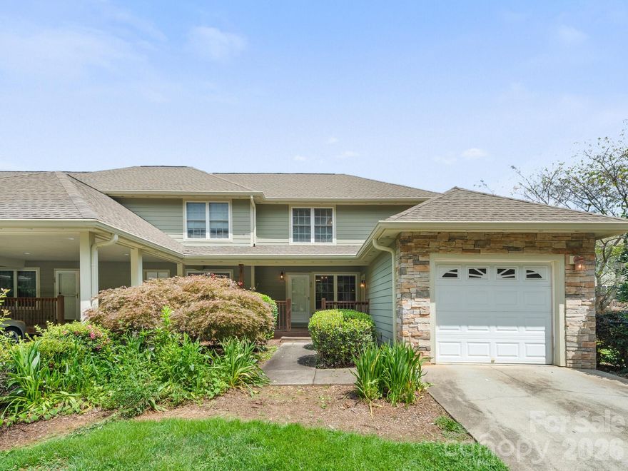 Stylish end-unit townhome in the desirable Lake Julian Trails community featuring BRAND NEW appliances. This beautifully maintained 3-bedroom, 2.5-bath residence offers a bright, open-concept main level with rich wood flooring and a seamless flow between the kitchen, dining, and living areas. Upstairs, two spacious primary suites provide exceptional comfort and privacy, each offering generous space and natural light. The home’s charming stone-accented exterior enhances its curb appeal, while the private back deck creates a perfect setting for outdoor dining, grilling, or relaxing after a long day. Ideally located with convenient access to Asheville, Hendersonville, and Brevard, this home is just minutes from parks, scenic trails, shopping, dining, and the interstate. The HVAC system also includes approximately five years remaining on the warranty, adding additional peace of mind. Experience comfort, convenience, and low-maintenance living in one of the area’s most desirable locations. Don’t miss this exceptional opportunity!