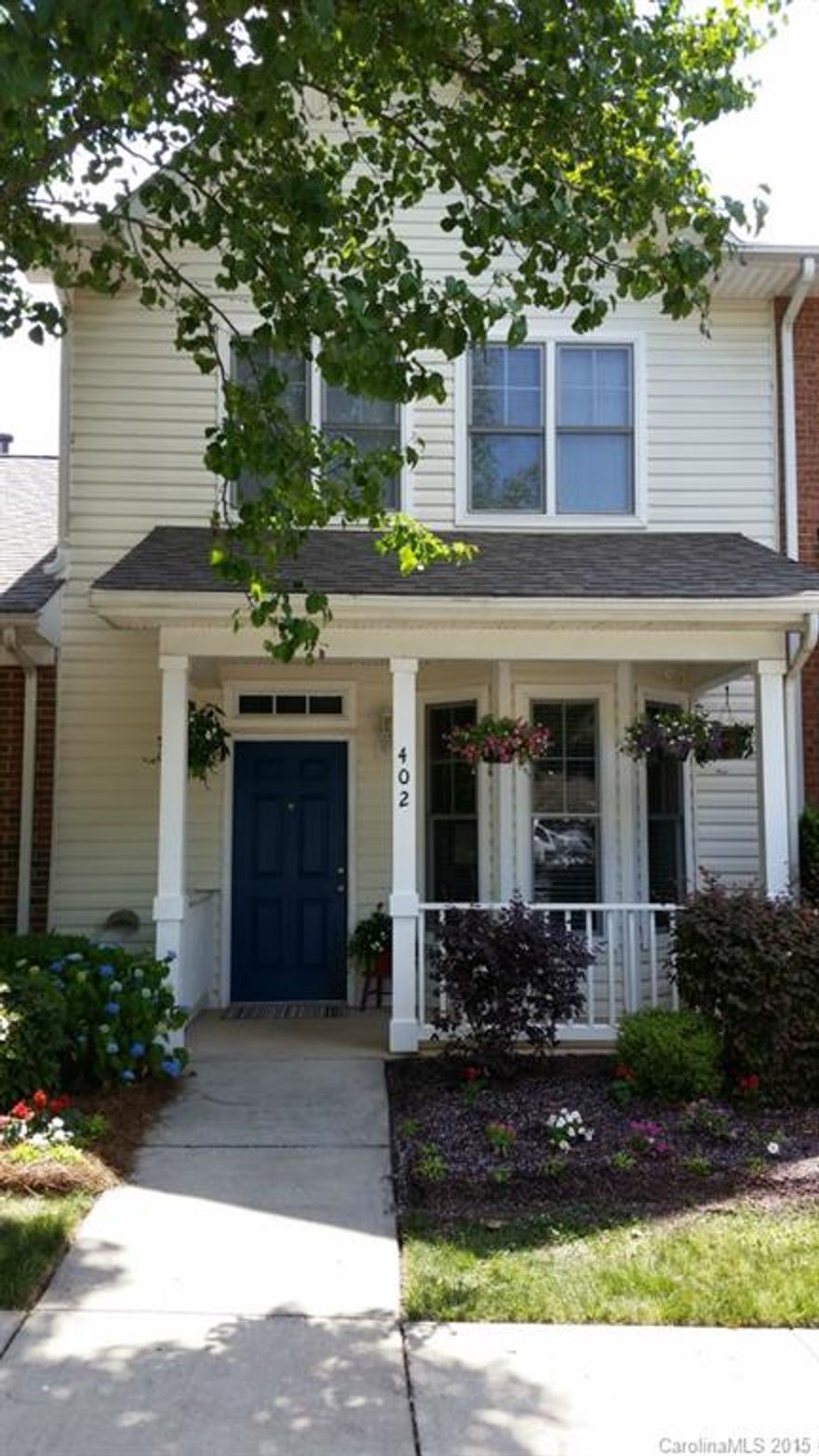 A TREASURE! Move-In Ready!! Upgraded Kitchen with Granite Countertops and Glass Tiled Backsplash. Master Bath and Powder Room have Granite Countertops. Updated Ceiling Fans. Beautiful Fireplace & Mantle in Great Room, Huge Bay Window! Double Master Bedrooms each with Bathroom. Fenced Patio & Deck, Large Utility Closet. Very Bright and Sunny Unit! Community Clubhouse, Pool and Tennis Courts. Prime Location!!  Excellent Fort Mill Schools! A Must See! Make this House your Home!