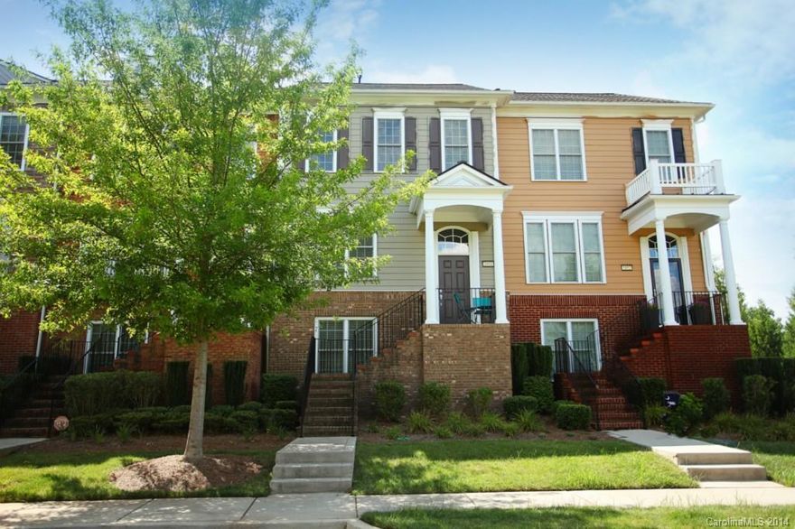 This is a Must See Townhome! Gorgeous 4 BD 3.5 BA TH with a modern flair! Featuring:  dark hardwoods, rich cabinetry, wainscoting, security and more. Great Room with gas fireplace opens to Chef’s Kitchen with work island, Bkfast Bar, granite & GE SS Appliances.  Private Deck offers outdoor dining. Front Porch overlooking tree lined streets, across from park. Awesome community with walking trails, close to I-77, schools, library, YMCA, and medical facilities.  Great Fort Mill Schools!