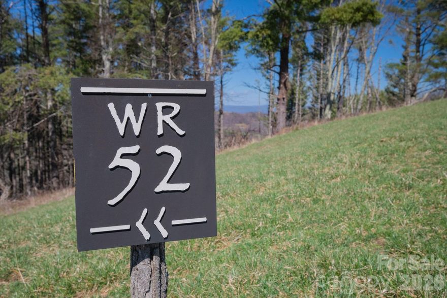 Experience elevated mountain living from this stunning 2.01-acre homesite with sweeping panoramic views at 4,500 feet in elevation, located in West Ridge — the newest gated enclave within The Lodges at Eagles Nest. Offering exceptional privacy and an easy build site, this premier property provides the perfect canvas to design and build your dream mountain retreat surrounded by the breathtaking beauty of the Blue Ridge Mountains. Wake each morning to long-range layered mountain views and unforgettable sunsets, where cool mountain air and serene surroundings create a true High-Country escape. With generous acreage and a peaceful setting, this homesite offers the rare combination of privacy, views, and accessibility within one of the region’s most sought-after luxury communities. Residents of The Lodges at Eagles Nest enjoy access to an unparalleled collection of world-class amenities, including fine dining at Epic Chophouse, the convenience of a 24/7 Dollar General, miles of ATV and hiking trails, outdoor amphitheater events, mini golf, fishing ponds, outdoor grilling pavilions, and a state-of-the-art fitness center. The property is also conveniently located near the North Pavilion, Sportsman’s Grill, and Eagles Nest Winery, offering endless opportunities for relaxation, recreation, and gathering with friends and family. Perfectly positioned in the heart of the High Country, this homesite is just minutes from the ski slopes of Beech Mountain and Sugar Mountain, the charming shops and restaurants of Downtown Banner Elk, and a short drive to Boone, Blowing Rock, and the scenic Blue Ridge Parkway. Whether you envision a luxury mountain estate, a family retreat, or an investment property, this exceptional homesite offers the opportunity to create something truly special in one of North Carolina’s most sought-after mountain communities. Don’t miss this rare opportunity to build your dream home in the newest section of Eagles Nest.